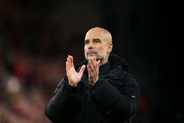 Manchester City's head coach Pep Guardiola applauds the fans at the end of the English Premier League soccer match