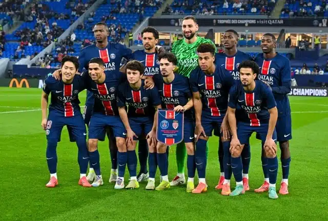 Players of Paris Saint-Germain pose for photos before the French Super Cup football final match between Paris Saint-Germain (PSG) and AS Monaco