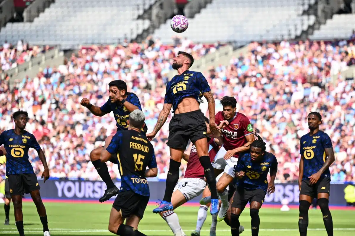 Olivier Giroud (9LOSC Lille) heads the ball in a high jump during the pre-season friendly match between West Ham United and Lille LOSC at London Stadium