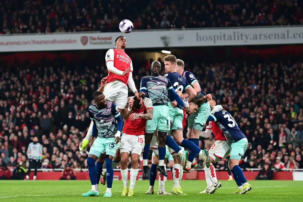 Gabriel of Arsenal FC rises to the crossed ball to threaten the Brentford goal, 2024